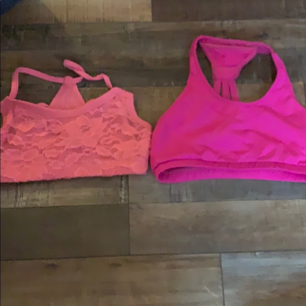 Two dance tops in pink size large and medium